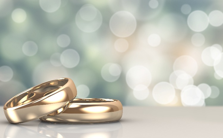 Up close image of gold wedding bands.